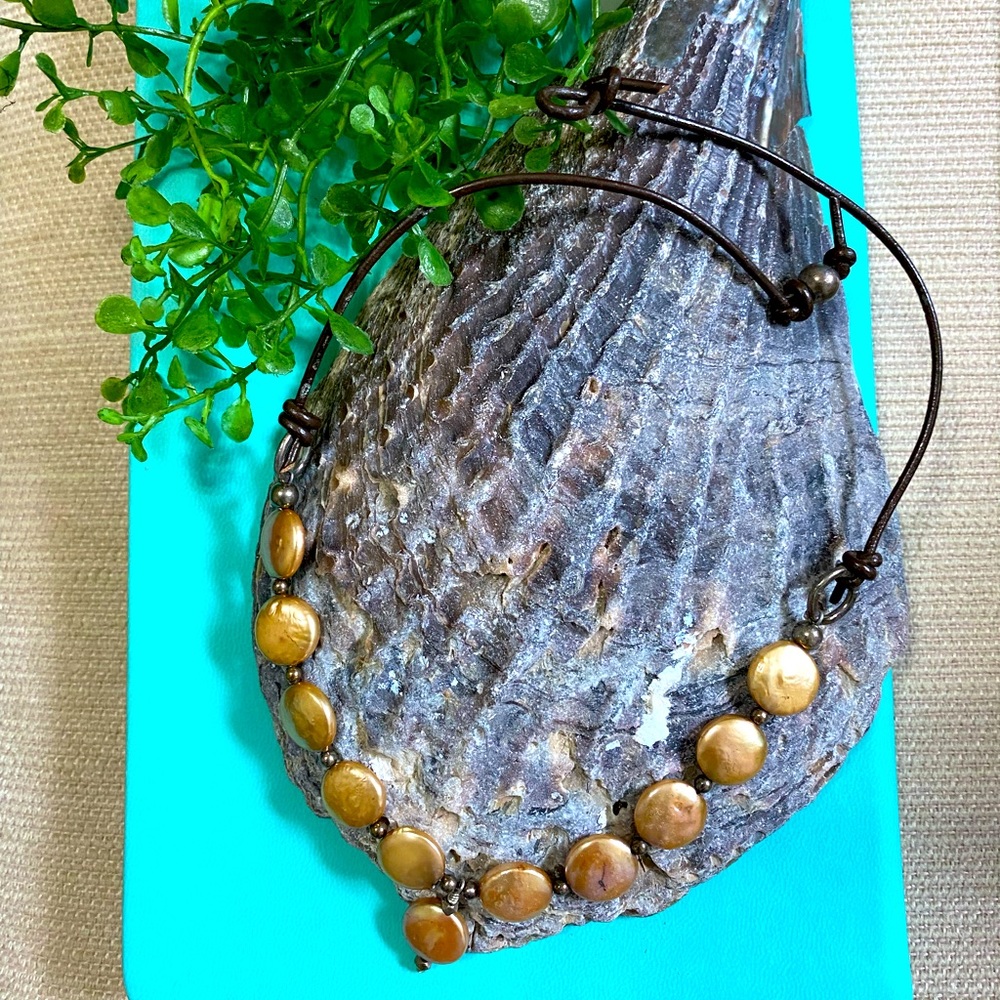 Beautiful hand made necklace with Leather cord and pearl accents